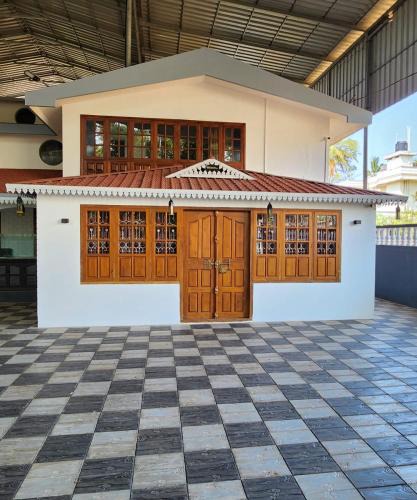 Kannur Hotel | Bharatham Heritage Inn