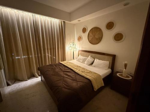 Sushant Lok Apartment | Noor by Saanjh, 1BHK Serviced Apartment, Boho Balcony, Golf Course Road, Sector 43