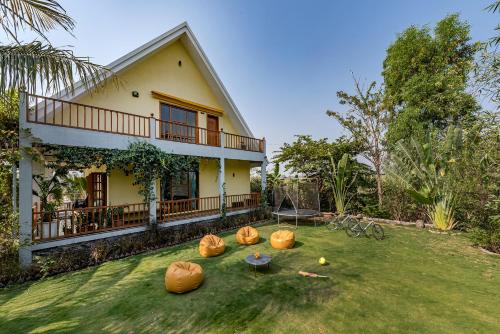 Daund Villa | SaffronStays Happy Fields - Swimming pool farmhouse with farm views, hammocks & farm-to-table dining near Pune