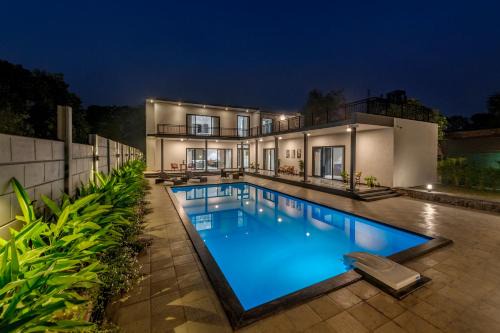 Alibaug Villa | SaffronStays Mayfair Gardens - 4BR pet-friendly pool villa with patio, den, board games & modern interiors near jetty