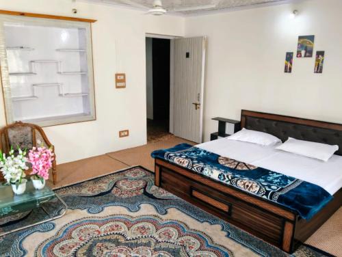 Rajbagh Ski Chalet | The Holt Gardens