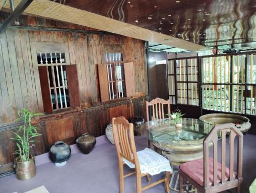 Changanacherry Apartment | Wooden Cottage