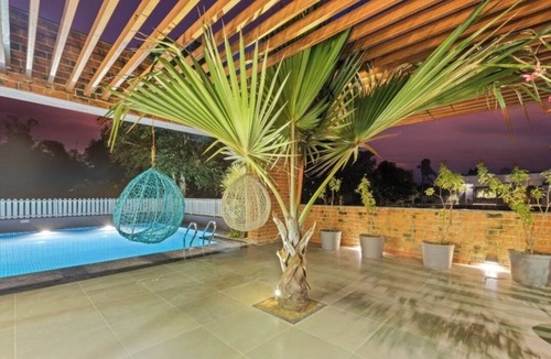 Borsad House | A beautiful & Green Farmhouse with a private Swimming pool & Garden .