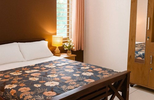 DPI House | Amruthadhara Abode – Elegant 2BR in Central Trivandrum