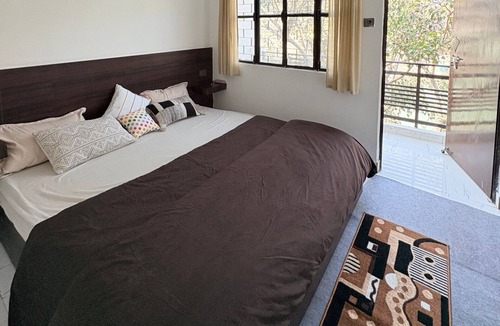 Rishikesh Bed & Breakfast | Aurovie homes |1 BHK Ganga Facing Stay with Private Ghat