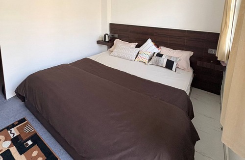 Rishikesh Bed & Breakfast | Aurovie homes |1 BHK Ganga Facing Stay with Private Ghat