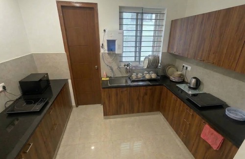 Agara Apartment | Balcony Deluxe Room with Washroom & Workstation inside a 4BHK Apartment