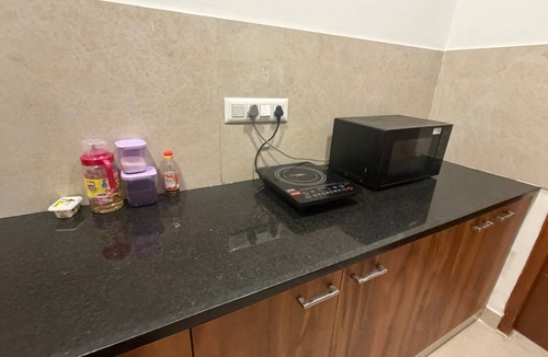 Agara Apartment | Balcony Deluxe Room with Washroom & Workstation inside a 4BHK Apartment