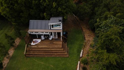 Matcham Ski Chalet | Central Coast Deck and Spa Luxury Tiny House with firepit