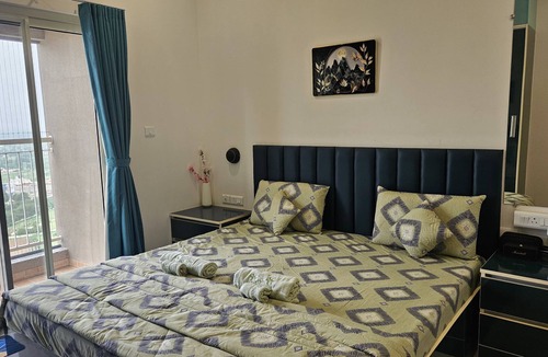 Gandhinagar Apartment | Chic 2-bedroom apartment with fitness room and AC in marvelous GIFT CITY.