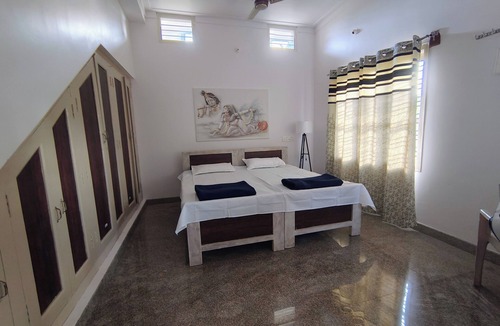 Shrirangapattana Bed & Breakfast | Cozy river Cauvery farmstay near Mysore. Cozy riverside views, yoga, and nature.