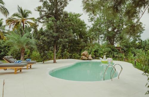 Gauribidanur Resort | ELIVAAS privé Ananta Bliss Talam Pet-friendly Retreat On 1-Acre of Land With 2-BHK Villa & a Tent, Shared Pool, Gazebo, Garden & a Firepit