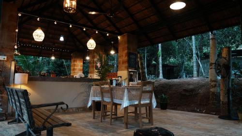 Mangalore Villa | Happy Haven Boutique Farmstay - Rustic Nature Retreat with a Private Cottage and an Open Air Kitchen