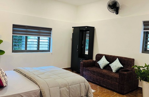 Thariyode House | Marvelous 2-bedroom bungalow, tranquility at our dam-facing Banasura Sagar Dam.