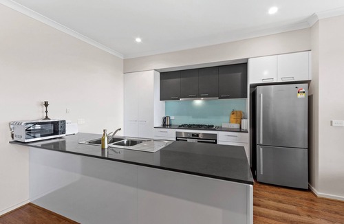 Sanctuary Lakes House | oriental botanical rosewood golf townhouse gym pool and buffet