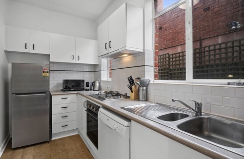 St Kilda West Apartment | Poolside Art Deco Apartment in St Kilda West
