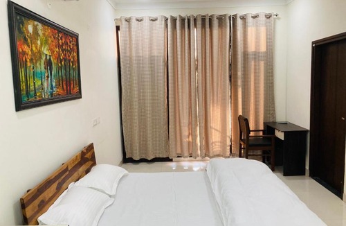 Panchkula Urban Estate House | Private room with balcony, wifi and smart tv