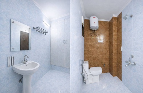 Nizamuddin East Hotel | Roomshala Sun Residency - Nizamuddin
