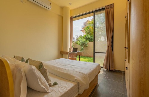 Malavli Villa | SaffronStays Ivory and Orange