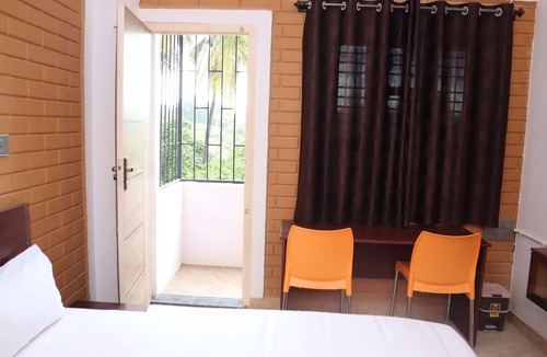 Tumkur Hotel | Smilestay Shree Jayaganga Arcade