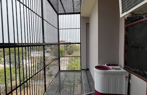 Greater Noida Apartment | Stay smart at Book N Go HomeStay – Cozy vibes, great location & homely comfort