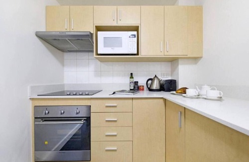 Darwin City Centre Apartment | Sweeping Harbourfront Views atop Tropical Resort