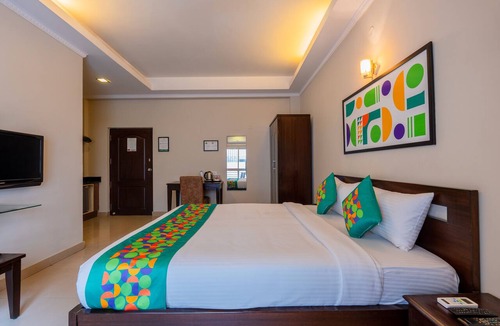 Koramangala Hotel | Treebo Ivory White Inn