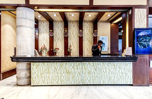 Lakdi Ka Pul Hotel | Treebo Trend Wood Bridge