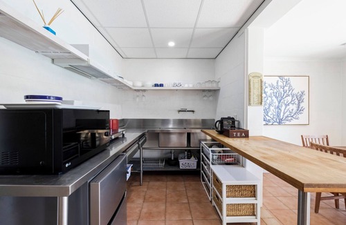 Emerald Beach House | Victoria’s Poolside Emerald Beach stay with Shared Pool, Near Beach and Cafes.