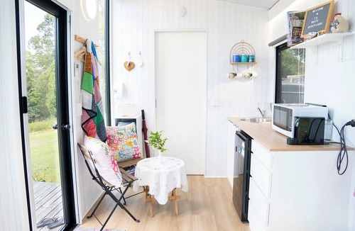 Maleny House | White Jacaranda Tiny House by Tiny Away