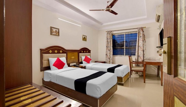Capital O Elegant Amethyst Business Hotel Near Ragigudda Sri Prasanna Anjaneyaswamy Temple