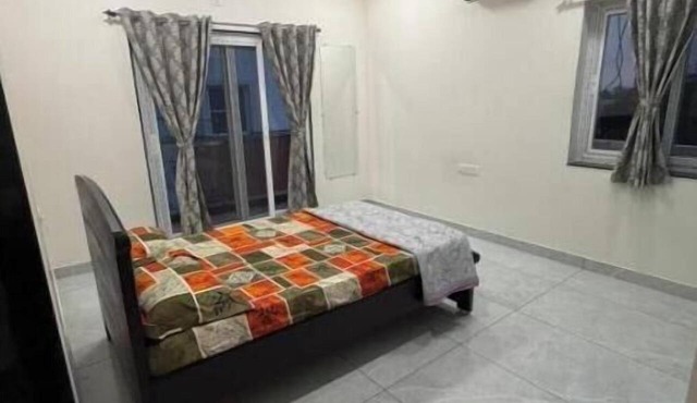 Elegant 2BHK Holiday Home with Terrace, Wi-Fi & Easy Airport Access