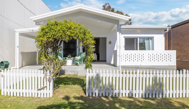 Experience the perfect blend of beachside charm and stylish holiday living in Woolgoolga