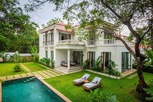La Branca by The Blue Kite - Luxurious 4 BHK villas near Peaceful Morjim Beach, with Private Pool, Big Garden, Security, Kitchen, Wifi, Terrace