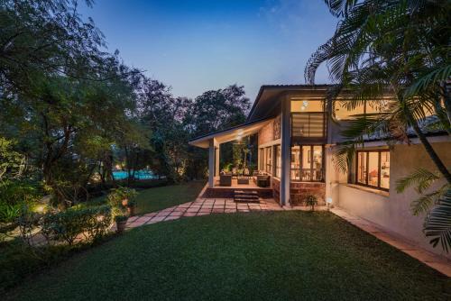 SaffronStays Laguna - 4BR vintage-chic villa with unique pool, gazebo & terrace sit-outs near Mandwa Jetty, Alibaug