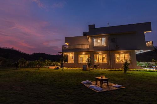 SaffronStays Midori - 4BR riverside villa with pool, lawn, terrace & access to Kundalika River rafting site