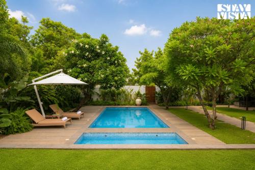 StayVista at Coastline Villa 138 with Pool, Gazebo & Bar