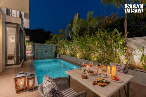 StayVista at The Heliconia Bungalows with BBQ & Pool