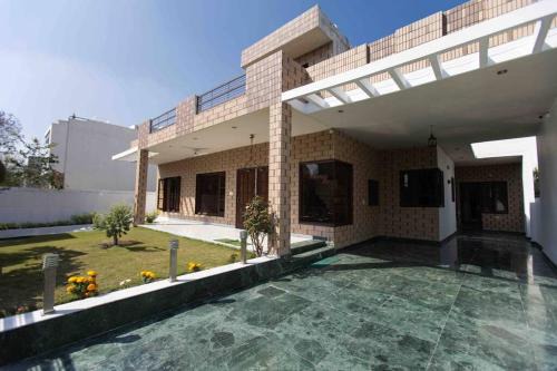 The Lawn House 3BHK Villa with parking space