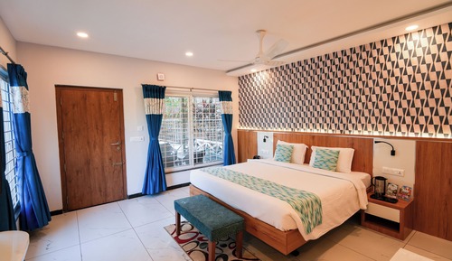 Private Cottage - King Bed - Pool view - Sitout