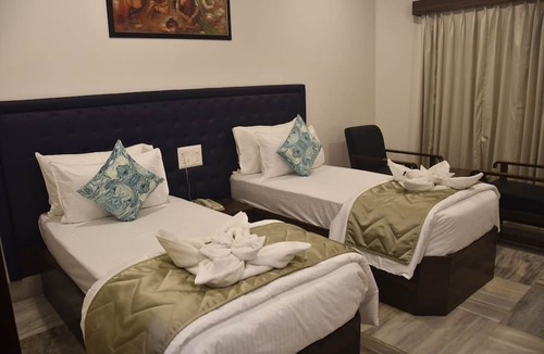Gangavathi Hotel | Kyriad Sarvesh Gangavathi Hampi