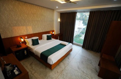 Kuzhuppilly Resort | Palm Wave Beach Resort
