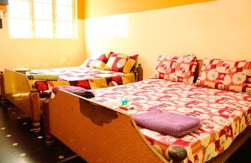 Chikkaballapur Hotel | I-ROOMZ Surya Deluxe Lodge