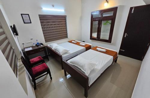 Guruvayur House | Guruvayur Nest Homestay - 4 BHK Villa Ground Floor