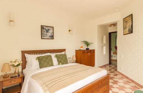 Nerul Apartment | El Volar by The Blue Kite - 2BHK, 5 Mins to Casino & 10 Mins to Candolim Beach with Big common Pool, Fully Equipped Kitchen, 24x7 Security, WiFi