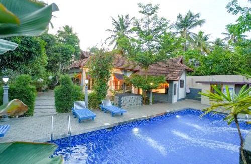 Kovalam House | Pop Tavern Private Pool Villa Kovalam by VOYE HOMES