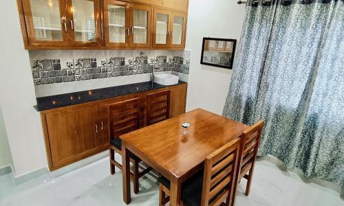 Tirupati Apartment | TrueLife - Chinmai Nivas - Breakfast Included - Modern 2BHK homes for families - Tirumala Mountain View - Fast WiFi - Many restaurants nearby - Hall, AC bedrooms, Modular Kitchen - Android TV - 250 Jio Channels - Top Service with lots of Love