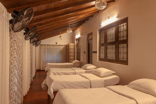 The Oneness Living- Seasonal Heritage stay with Tholpaavakoothu nights